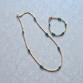 boho gold with greenish blue necklace and bracelet set
