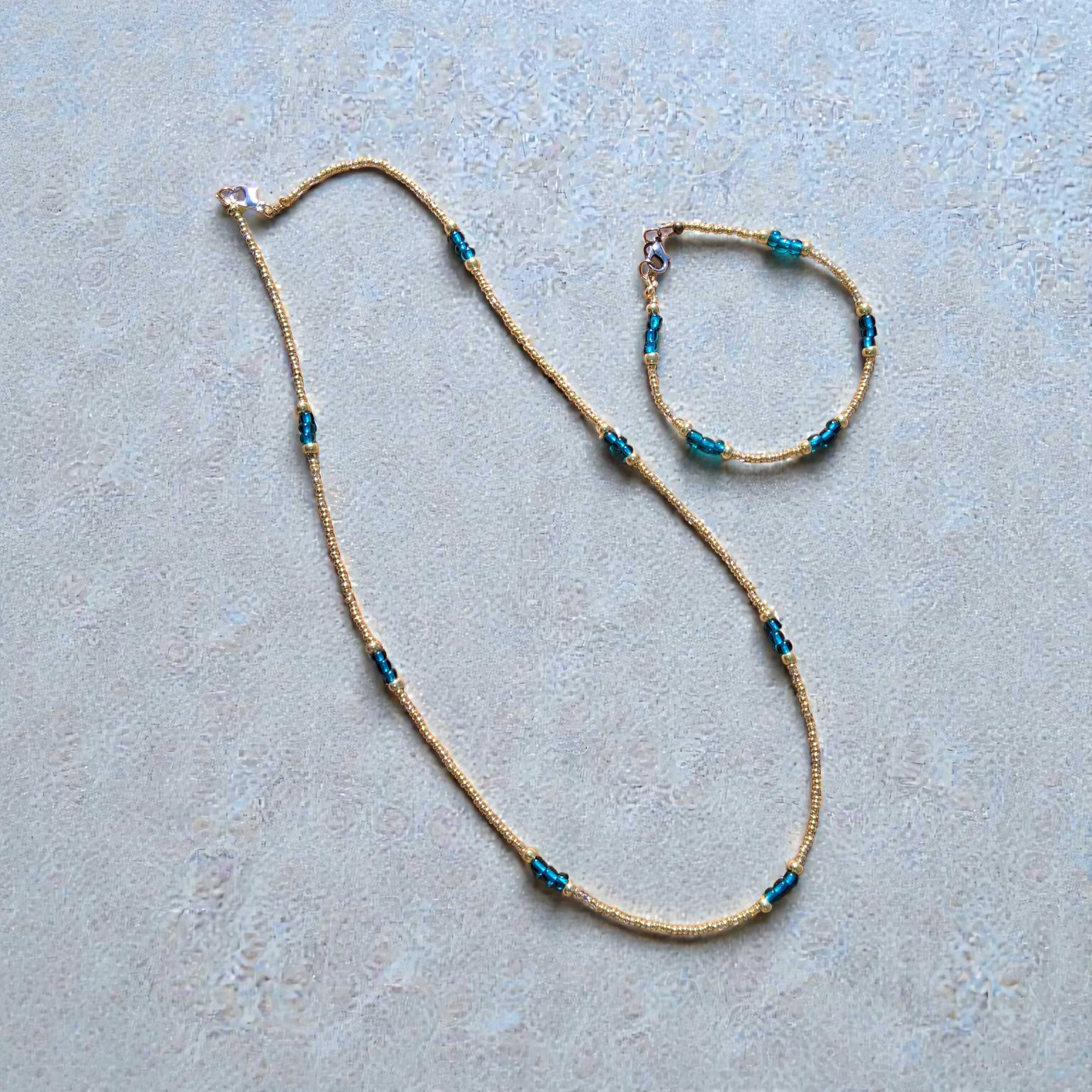 boho gold with greenish blue necklace and bracelet set